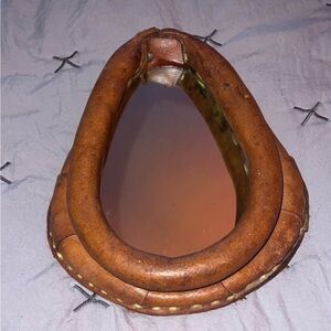 Antique Leather horse collar mirror.